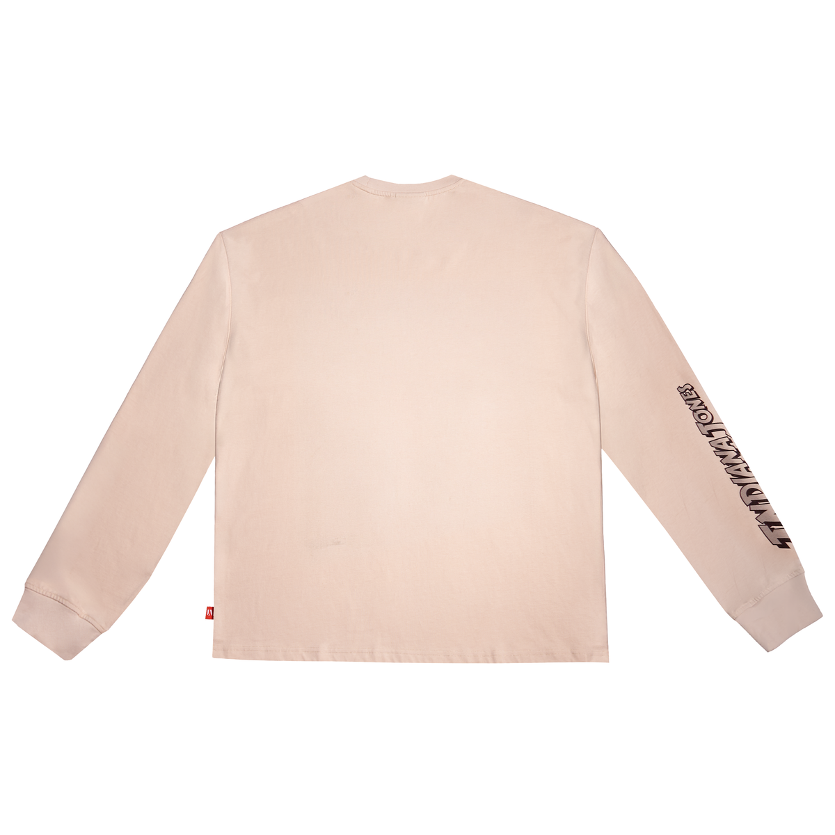 A light beige long-sleeve t-shirt shown from the back, featuring black graphic lettering reading. 'INDIANA JONES' printed down the right sleeve and a small red tag on the left hem, set against a plain white background.