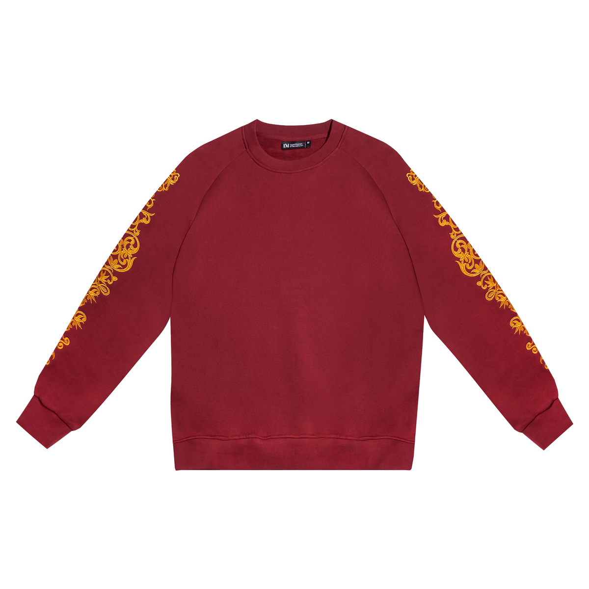 A crewneck sweatshirt in deep burgundy with ornate gold baroque-style embroidery running down both sleeves, displayed flat against a solid white background.