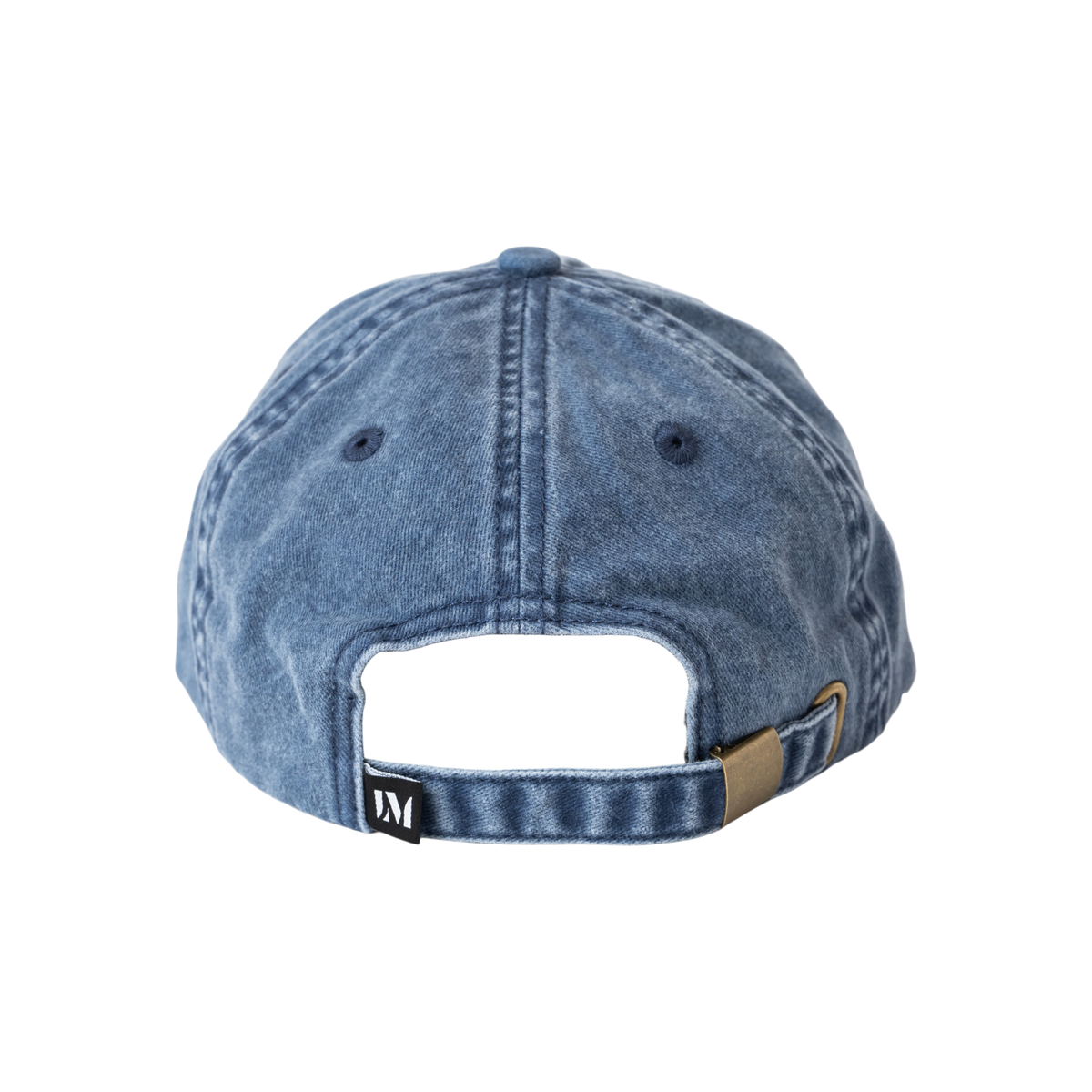 Washed cotton cap featuring embroidered text reading “Unreliable Narrator,” with an adjustable back strap and metal fastener. Interior seams are finished with logo-branded binding.