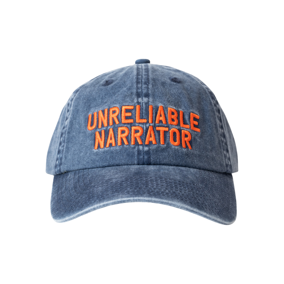 Washed cotton cap featuring embroidered text reading “Unreliable Narrator,” with an adjustable back strap and metal fastener. Interior seams are finished with logo-branded binding.