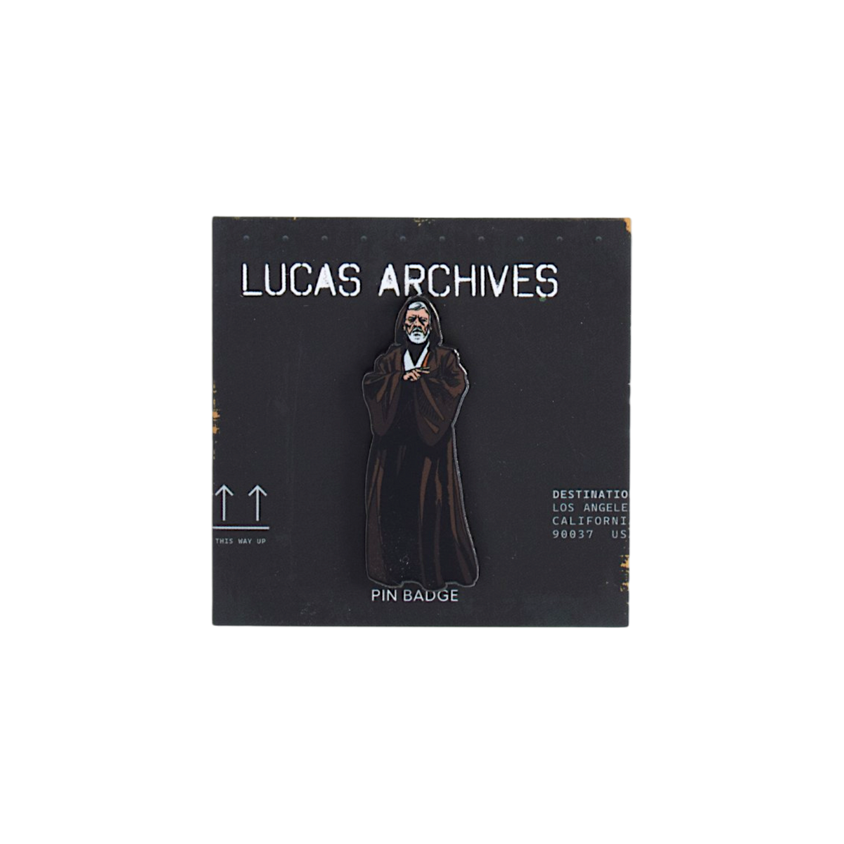 Lucas Archives pin badge displayed on a black backing card, featuring Obi-Wan Kenobi with a white beard and hood, shown against a plain background.