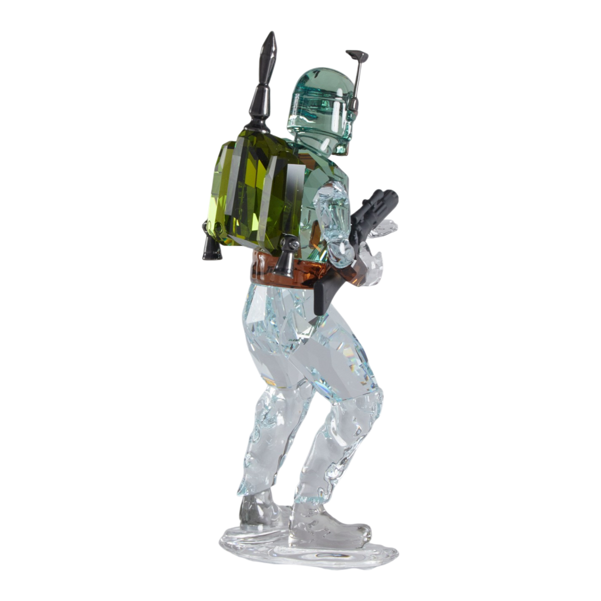 A clear faceted Swarovski crystal figurine of Boba Fett, holding a blaster, standing on a transparent base against a plain white background.