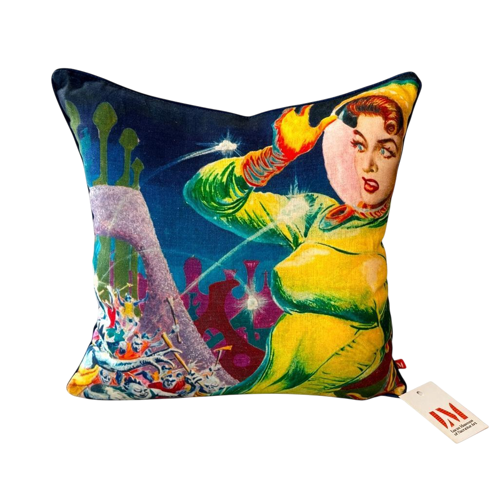 18 in x 18 in linen cushion cover featuring Freas Alternate Universe artwork. The vibrant science-fiction illustration depicts a figure in a bright yellow-green spacesuit set against a futuristic alien landscape with colorful spacecraft, abstract structures, and glowing celestial effects. Shown on a white background with a Lucas Museum of Narrative Art hangtag attached.