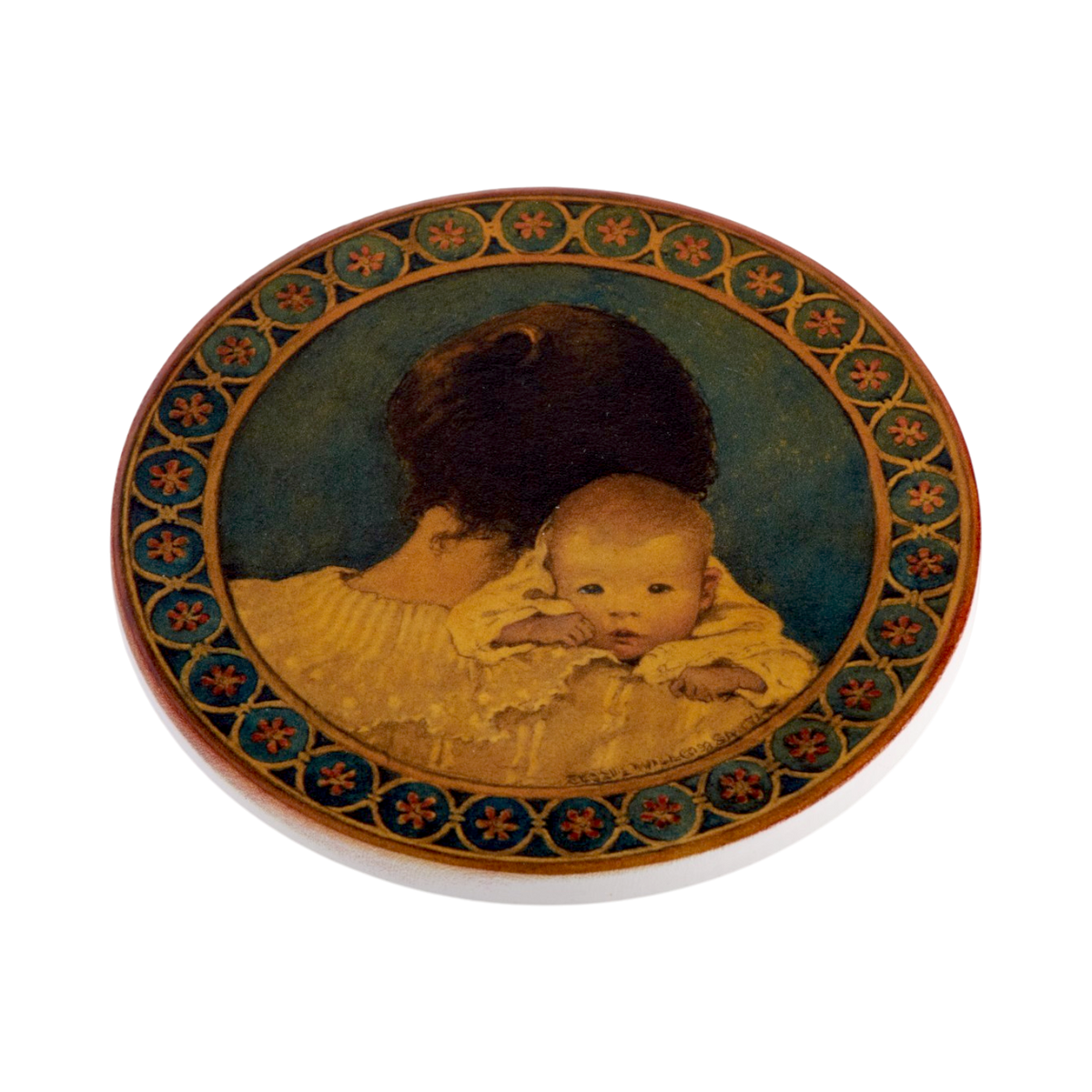 An oval coaster featuring a vintage-style Jessie Willcox illustration of a mother holding a baby, shown on a clean white background.