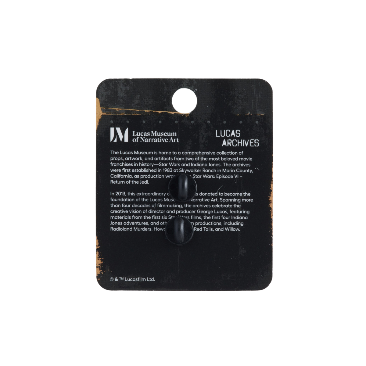 Lucas Museum of Narrative Art collectible card on a black display card, featuring printed text and a small black figurine, photographed against a solid white background.