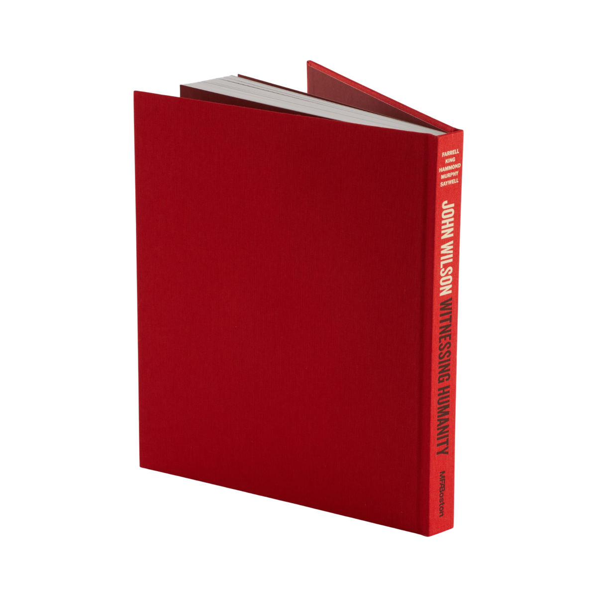 A hardcover book with a textured deep red cover and spine, shown standing upright at an angle on a plain white background. The spine displays the title 'WITNESSING HUMANITY' and the author's name, John Wilson, in white text.