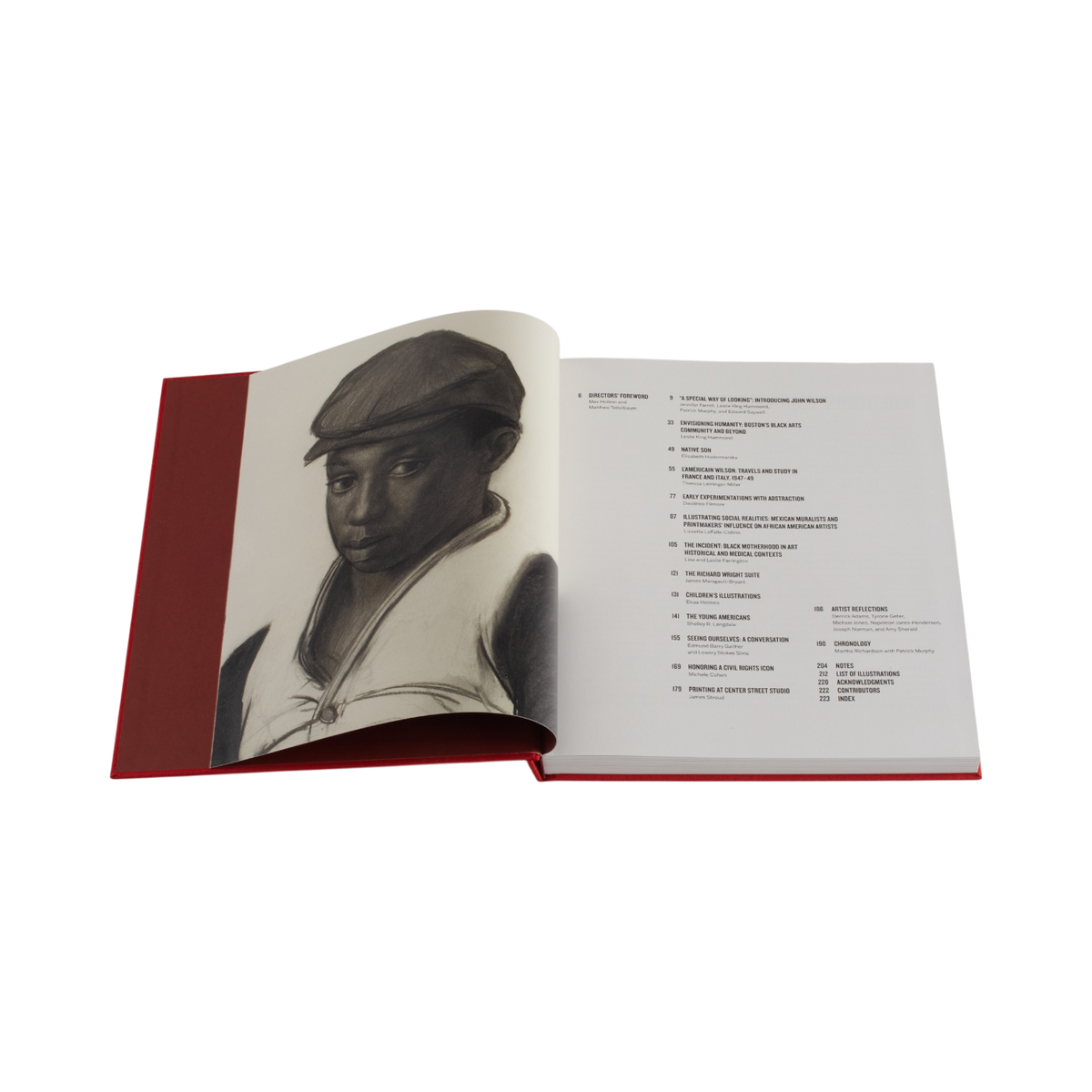 An open hardcover art book on a plain white background, showing a black-and-white portrait illustration on the left page and a printed text page on the right. The book has a red cover and white interior pages.