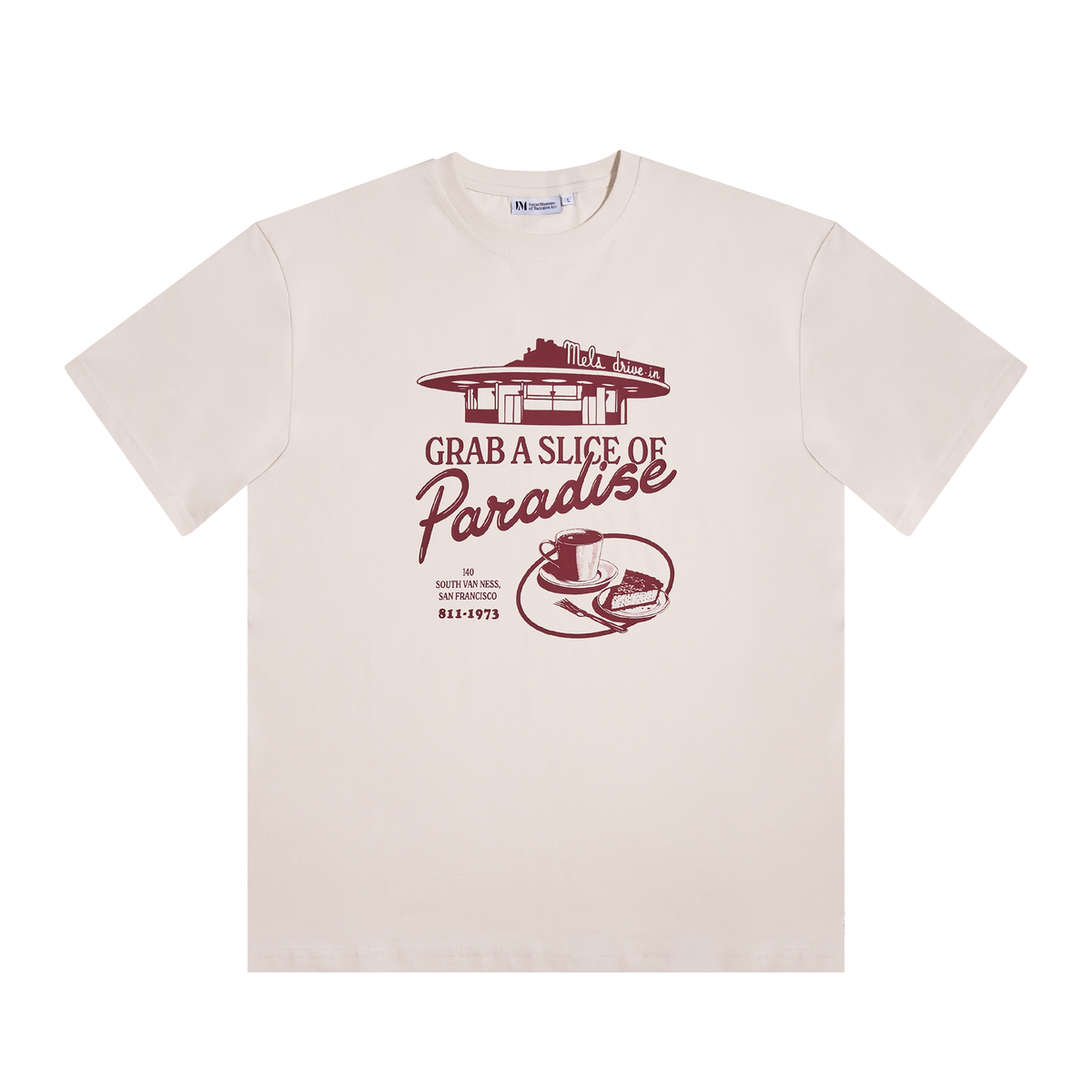A light beige crewneck t-shirt with a vintage-style maroon graphic on the front. The graphic features a diner illustration above the text 'GRAB A SLICE OF Paradise'.