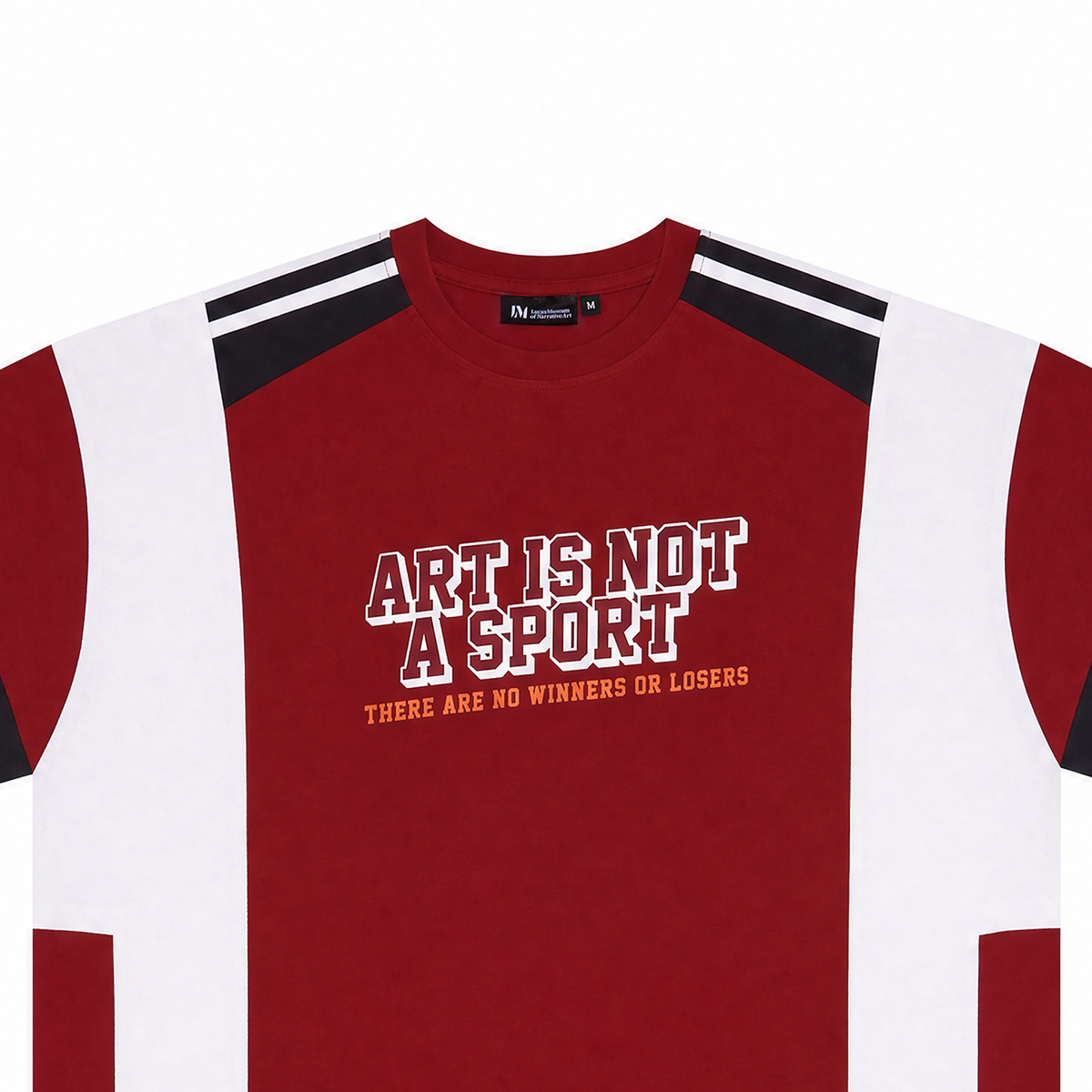 A red and white raglan-style t-shirt with black shoulder stripes, featuring the text 'ART IS NOT A SPORT' and 'THERE ARE NO WINNERS OR LOSERS' printed on the chest.