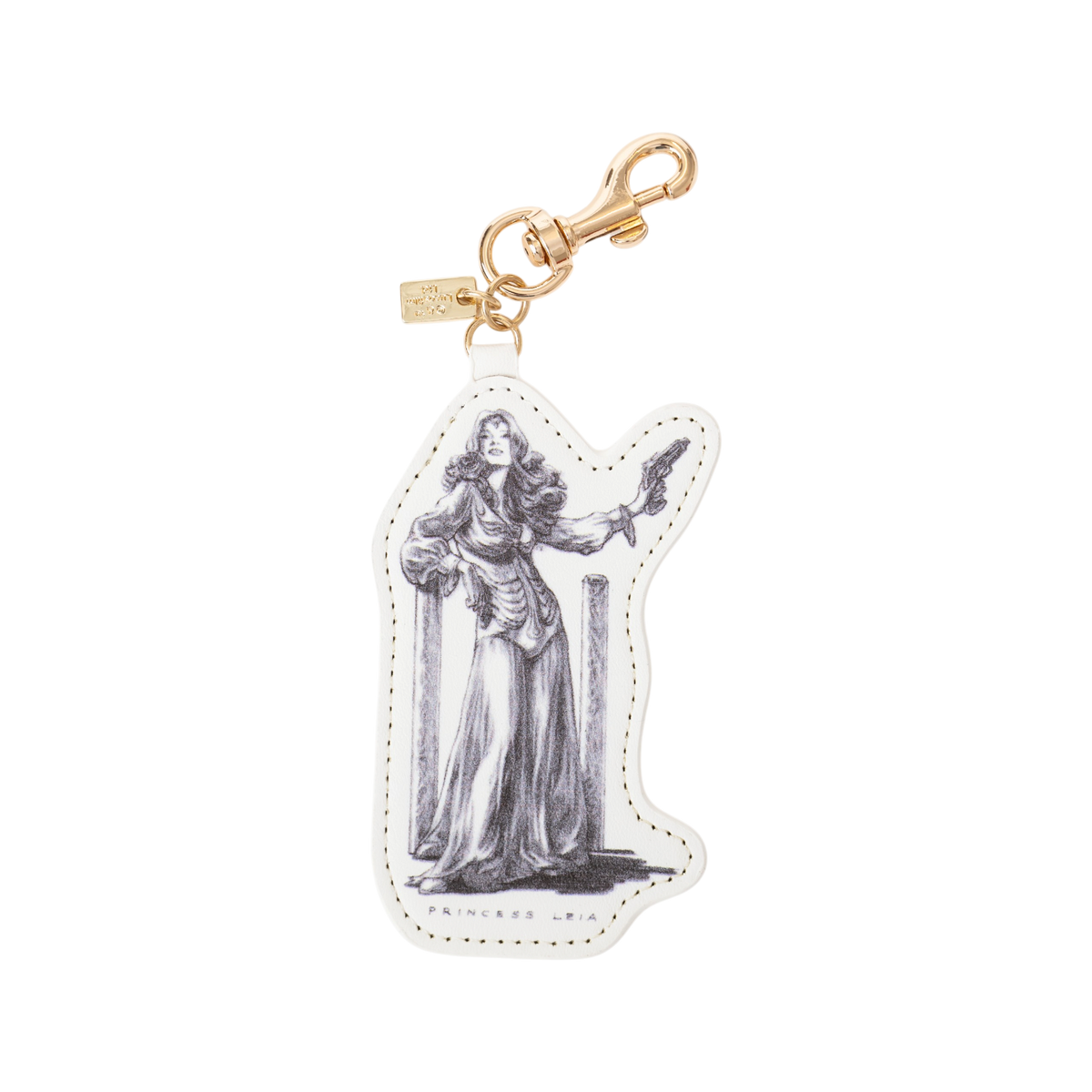 Bag charm featuring a concept sketch of Princess Leia, created circa 1975. Double-sided PU leather design with a metal swivel snap hook and branded metal logo tag, shown on a plain white background.