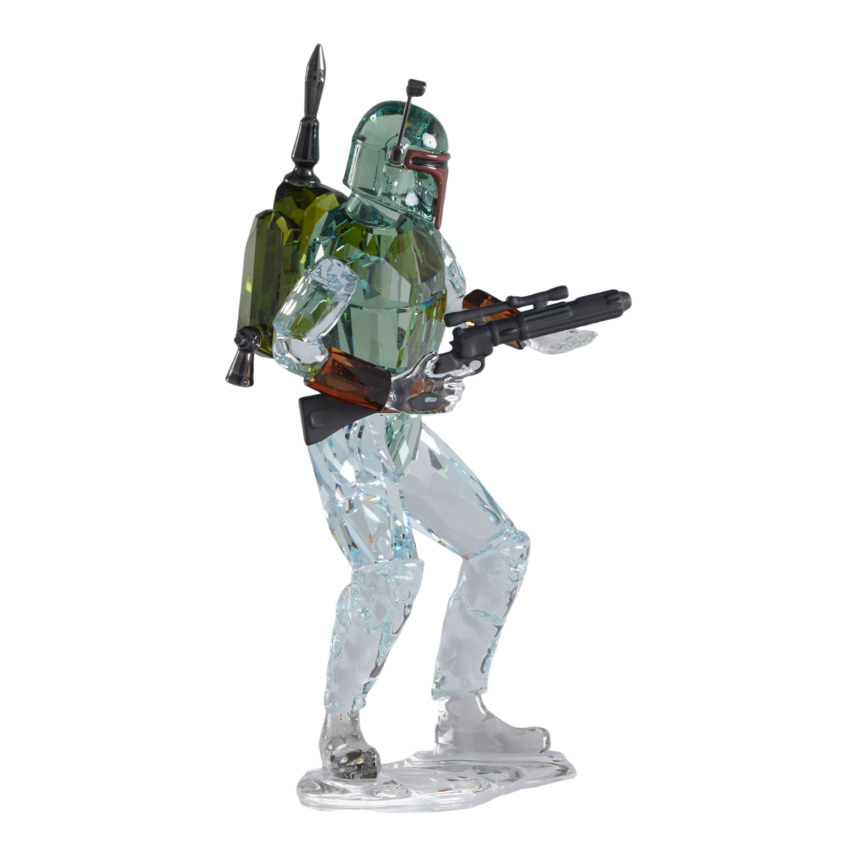 A clear faceted Swarovski crystal figurine of Boba Fett, holding a blaster, standing on a transparent base against a plain white background.