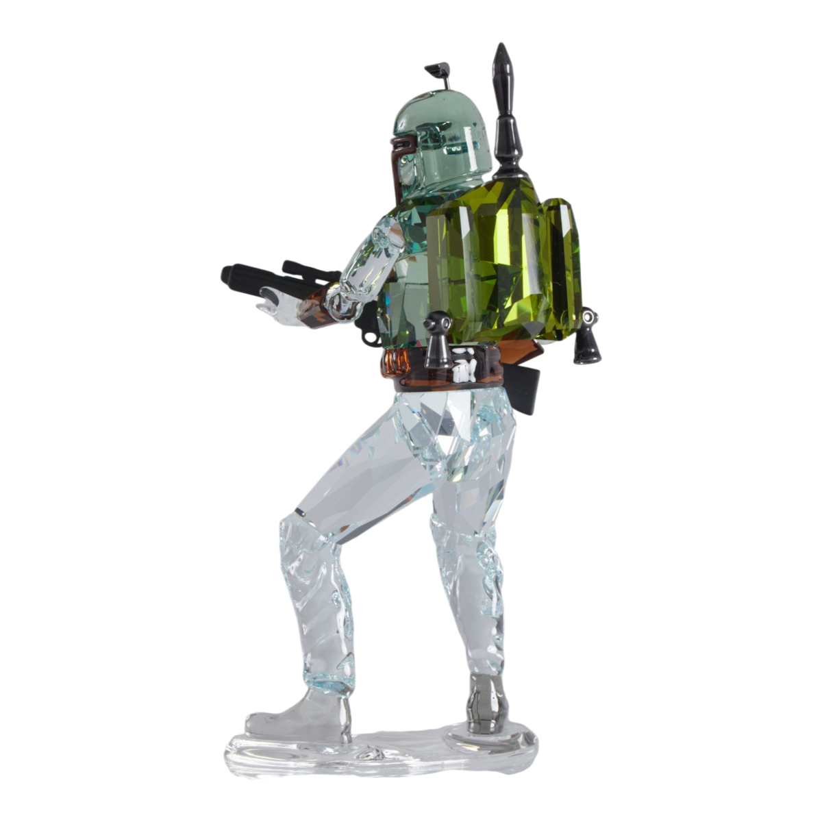 A clear faceted Swarovski crystal figurine of Boba Fett, holding a blaster, standing on a transparent base against a plain white background.