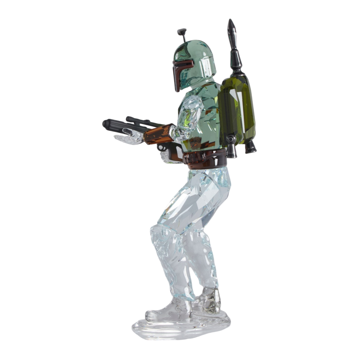 A clear faceted Swarovski crystal figurine of Boba Fett, holding a blaster, standing on a transparent base against a plain white background.