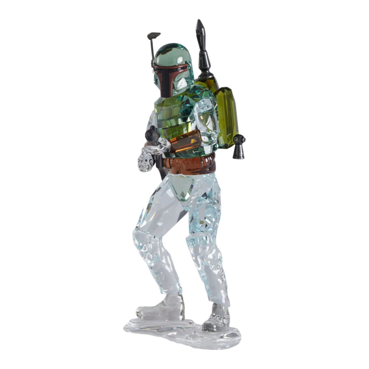 A clear faceted Swarovski crystal figurine of Boba Fett, holding a blaster, standing on a transparent base against a plain white background.