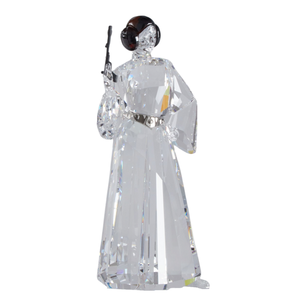 A clear faceted Swarovski crystal figurine of Princess Leia holding a black lacquered metal gun, standing on a transparent base against a plain white background.