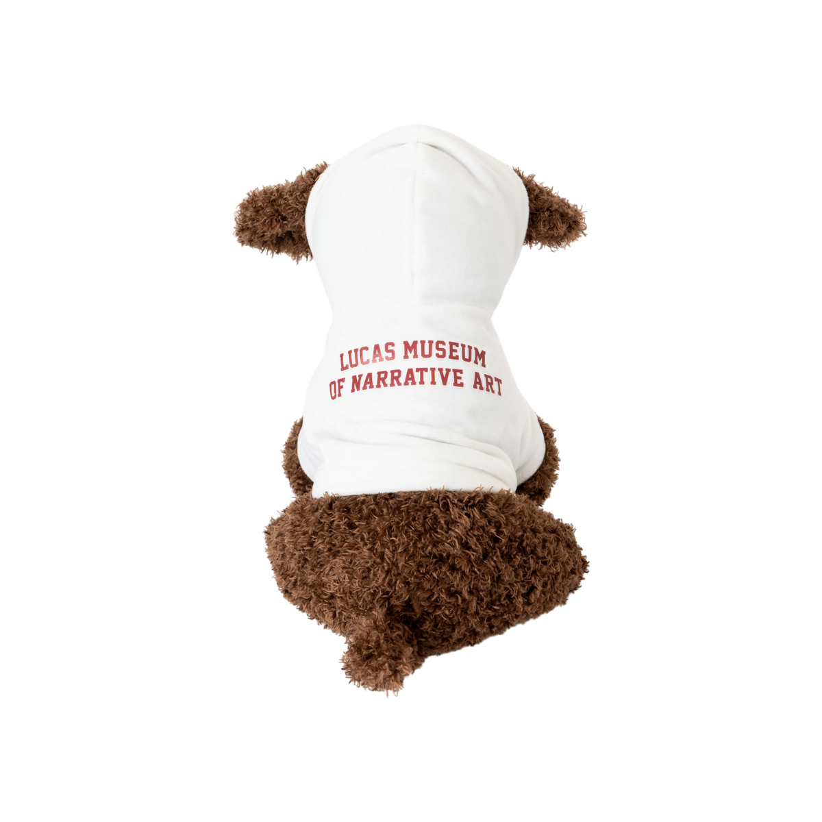 Brown plush dog toy wearing a white pet hoodie with red “Lucas Museum of Narrative Art” text, shown against a white background.