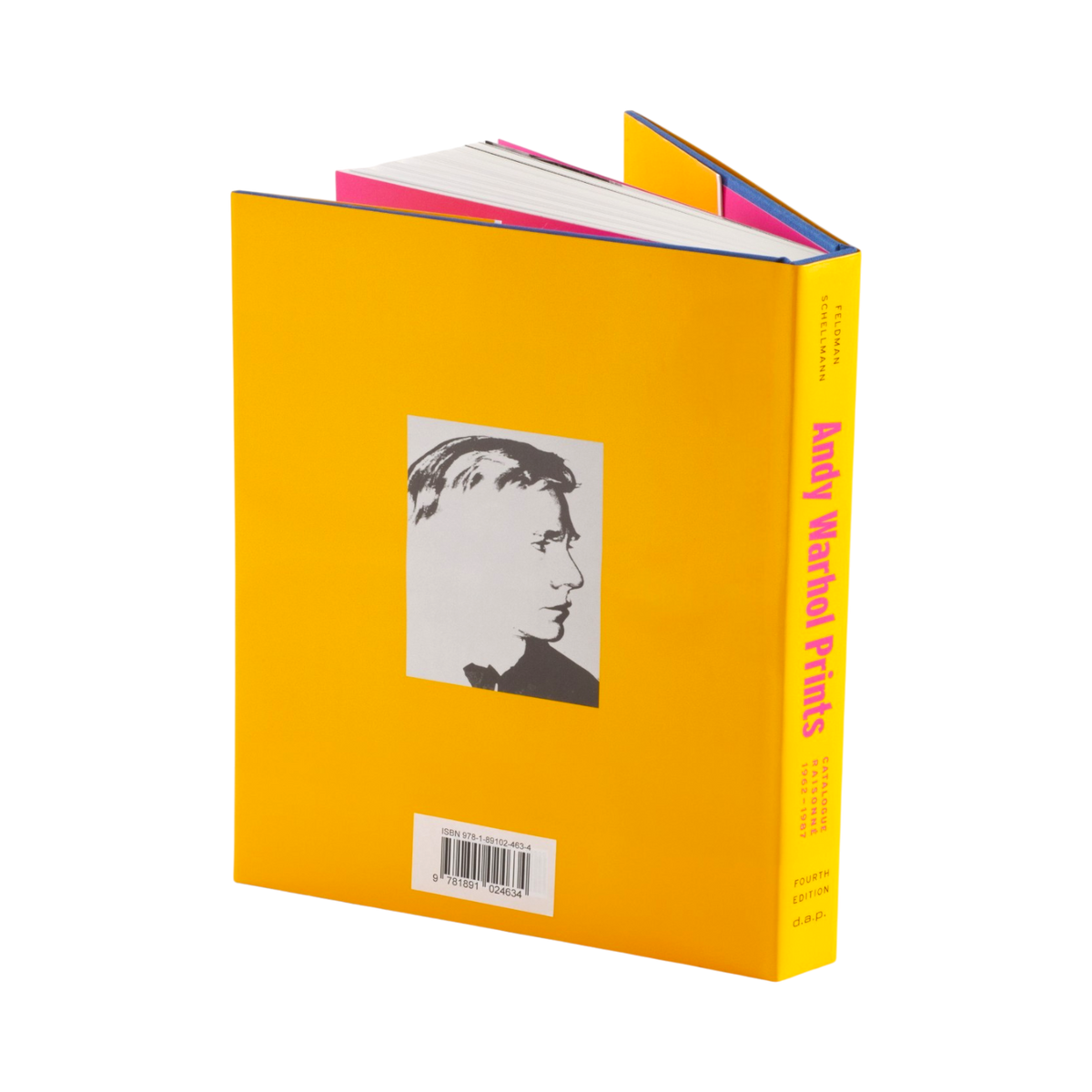 Andy Warhol Prints book shown at an angle displaying a bright yellow cover with a black-and-white portrait graphic and a barcode, plus a yellow spine with pink text.