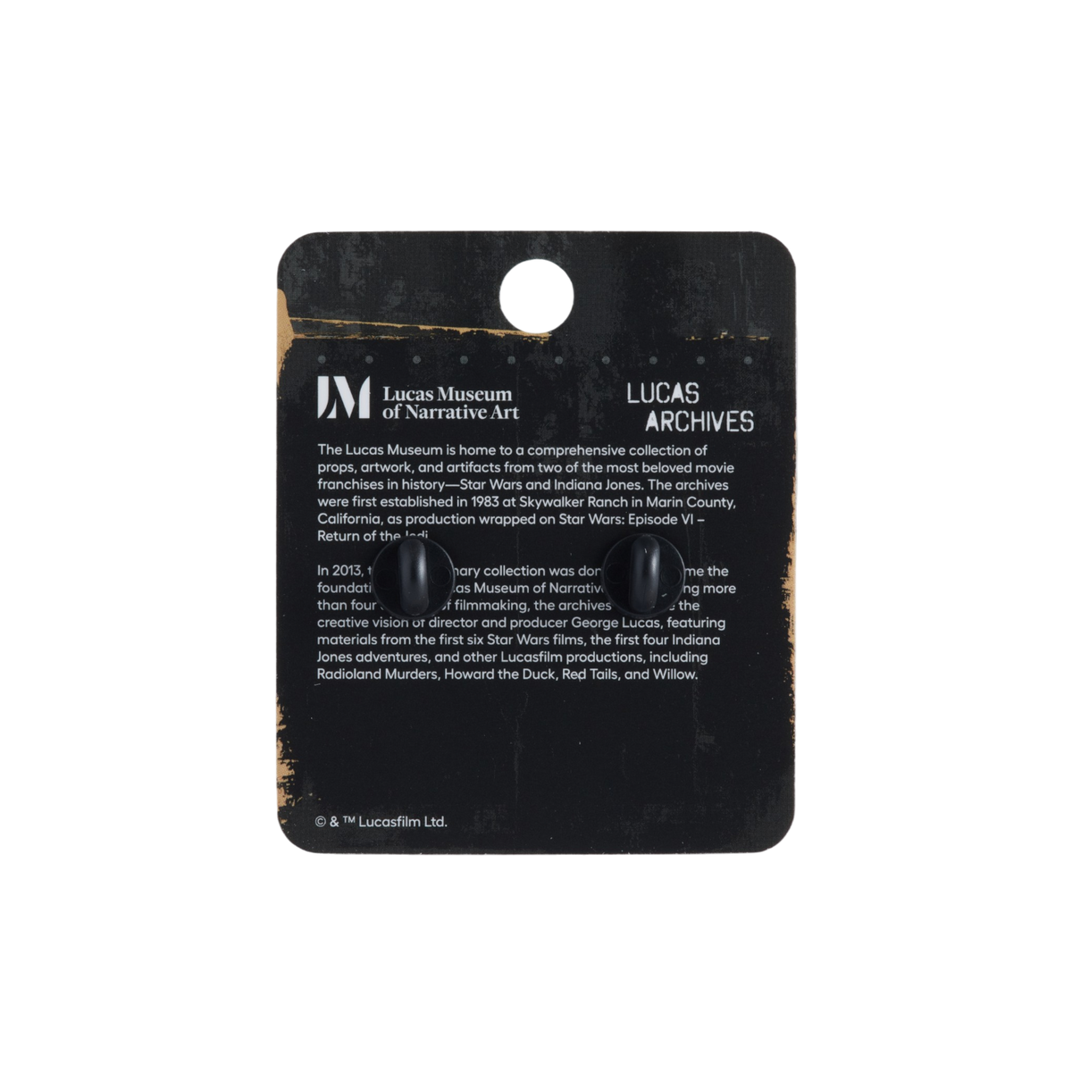 Lucas Museum of Narrative Art 'Lucas Archives' black display card with printed text and two small circular cutouts, shown on a plain white background.