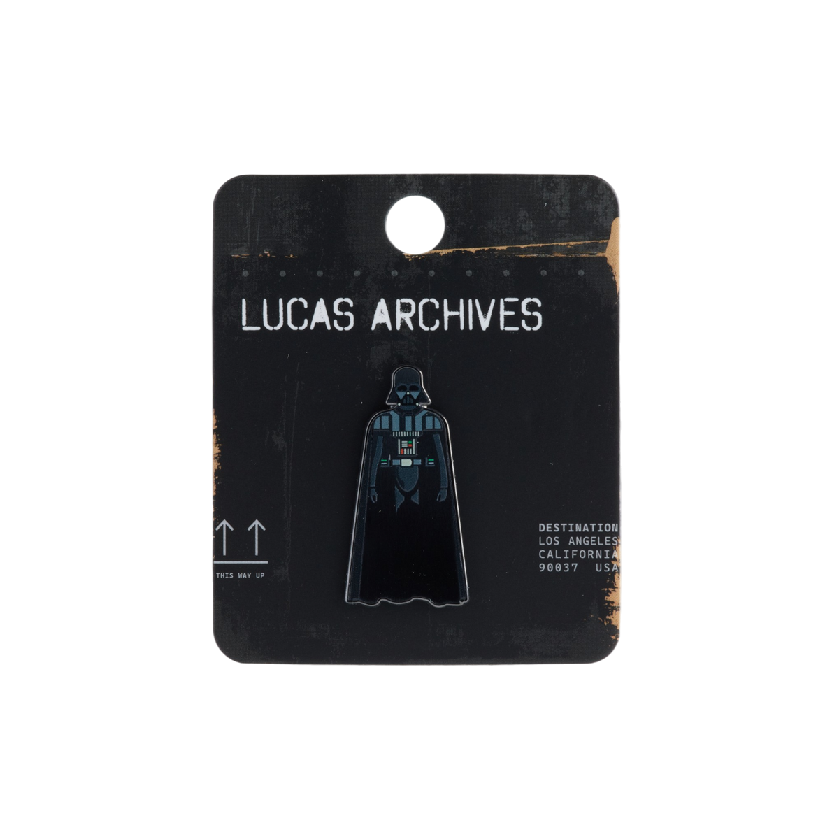 A Darth Vader enamel pin by Lucas Archives, displayed on its original black backing card against a clean white background.