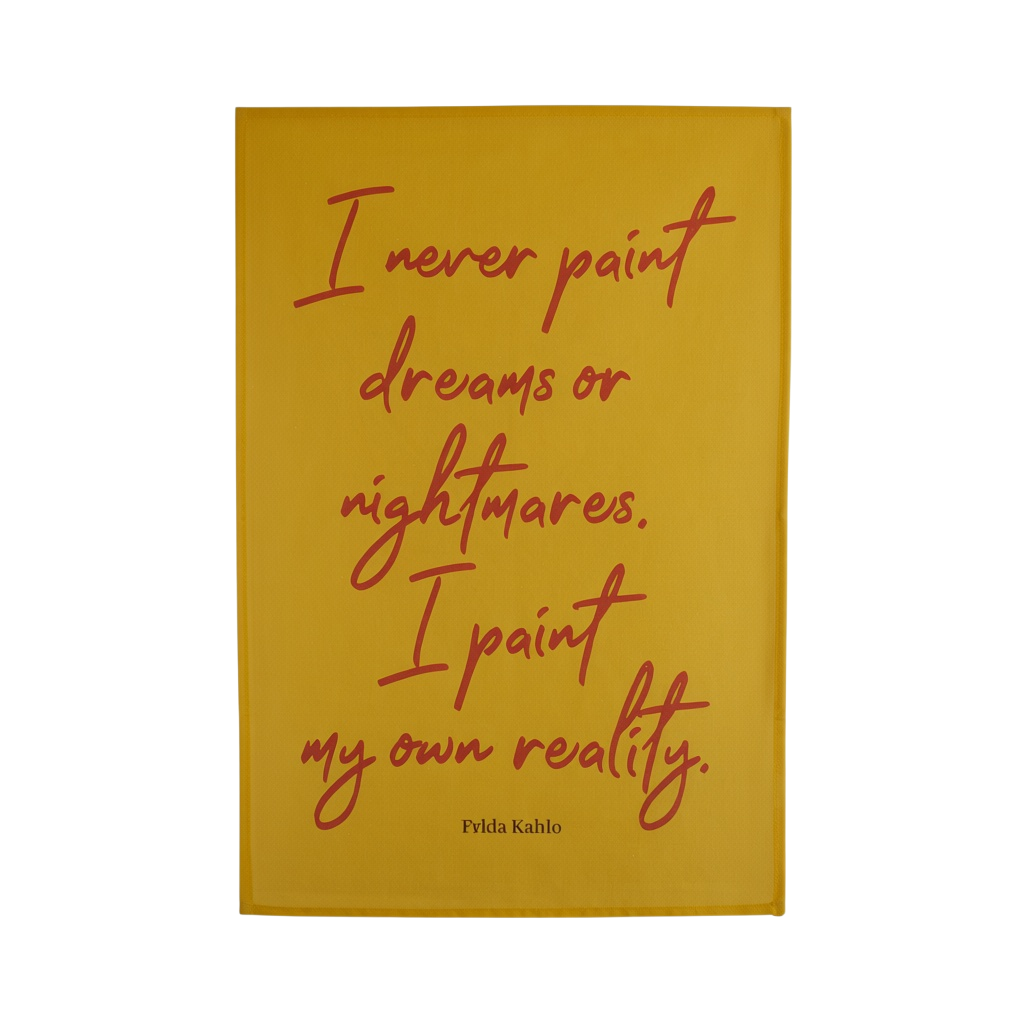 A tea towel featuring a quote by Frida Kahlo. The print has a mustard yellow background with the quote written in a dark red cursive font.