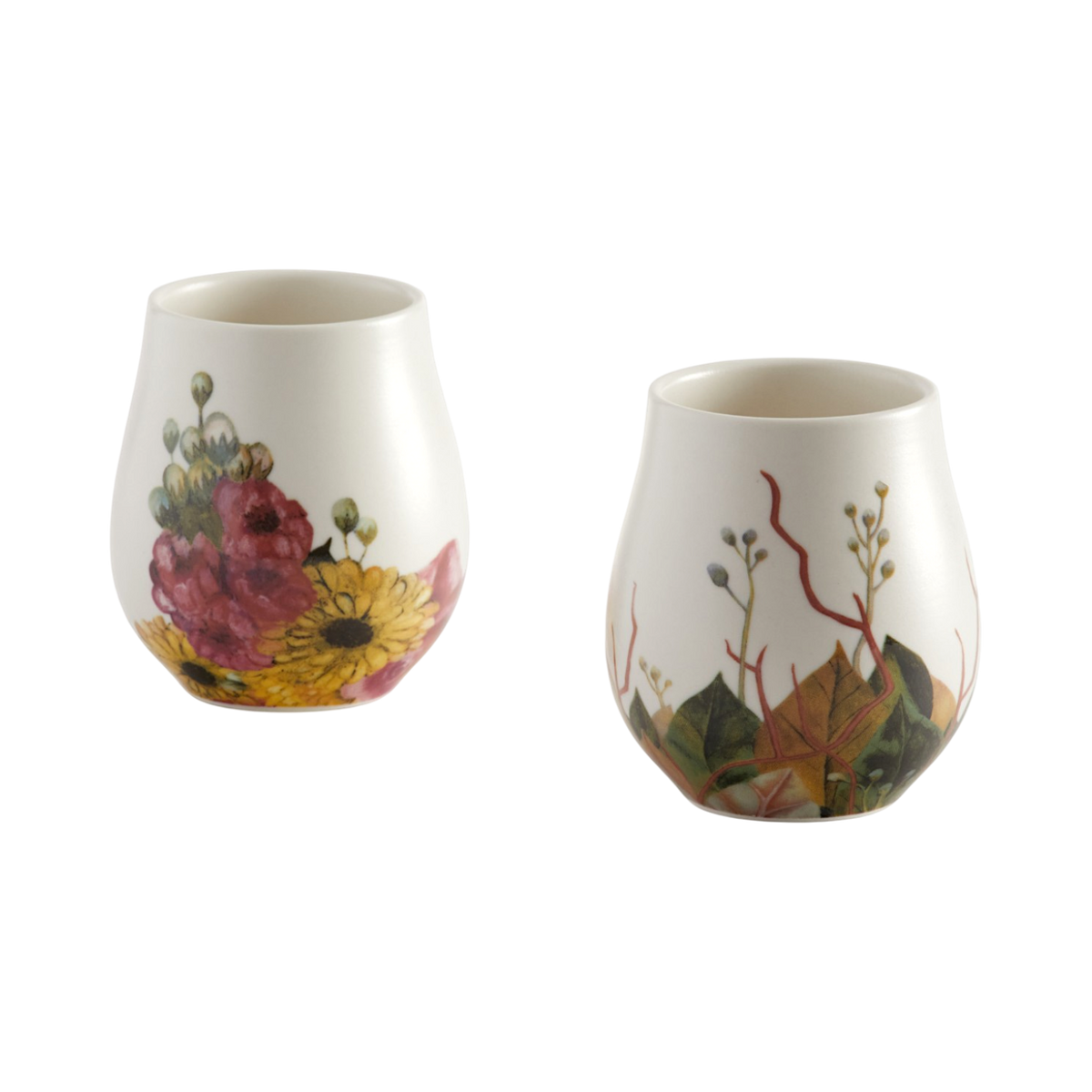 Two small white mugs with hand-painted botanical designs, one featuring pink and yellow flowers and the other featuring green leaves and red stems, on a plain white background.
