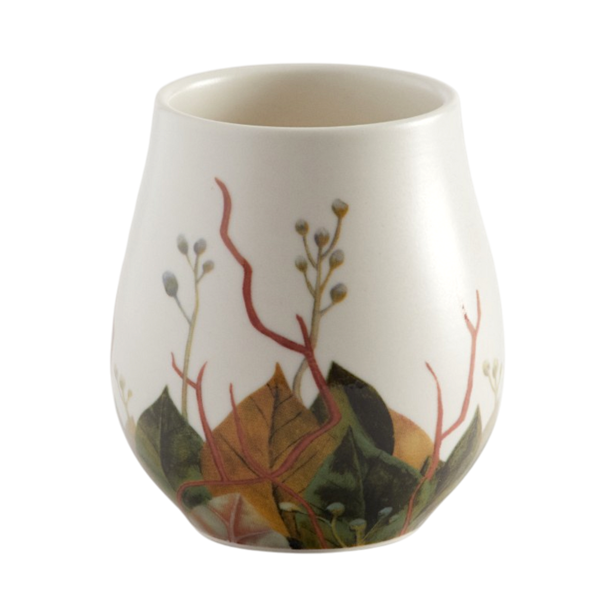 A small white ceramic cup or tumbler decorated with a botanical illustration featuring green leaves, brown and orange foliage, and red stems on a plain white background.
