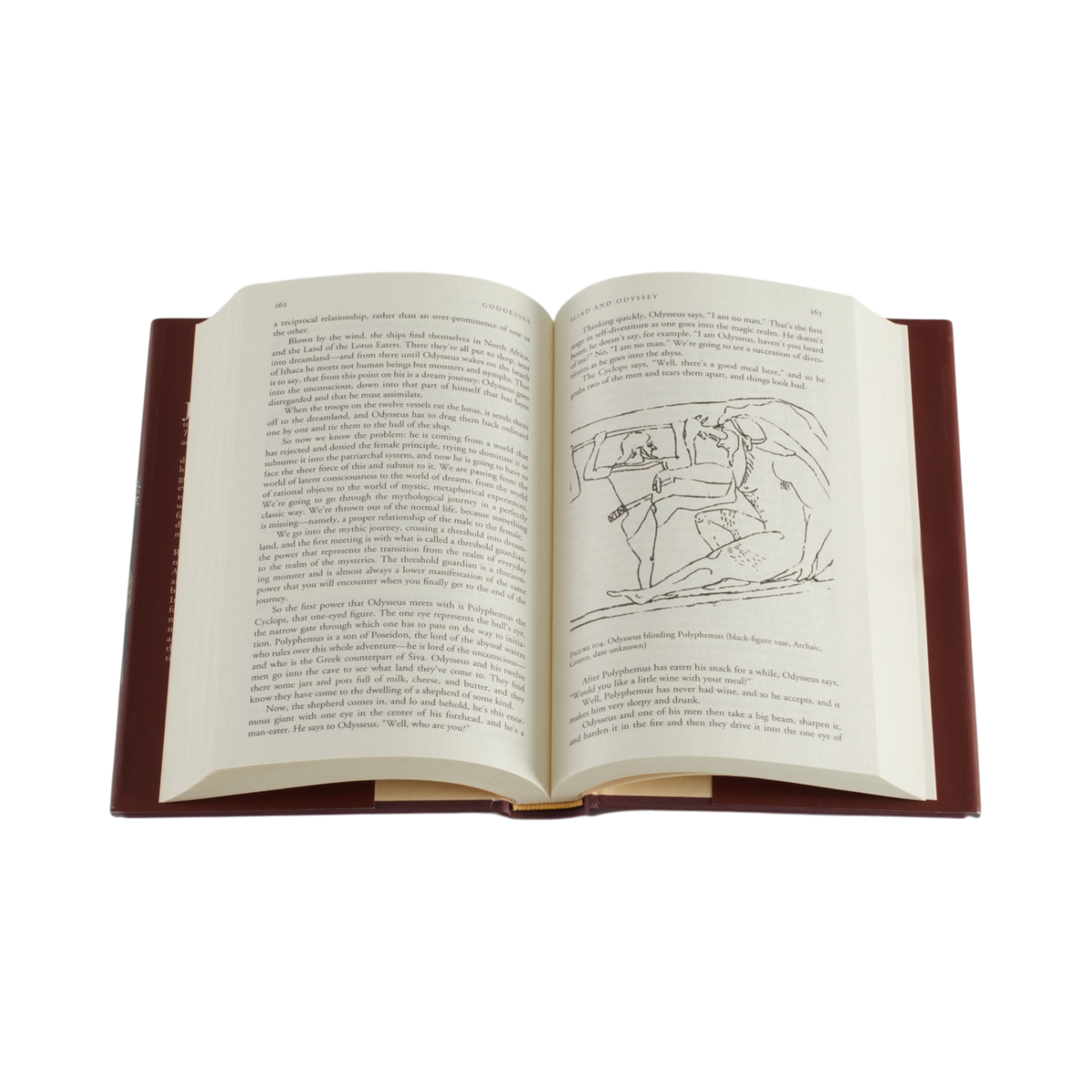 An open vintage book with cream-colored pages filled with printed text and a black line drawing on the right page, bound with a dark reddish-brown leather cover, shown against a plain white background.