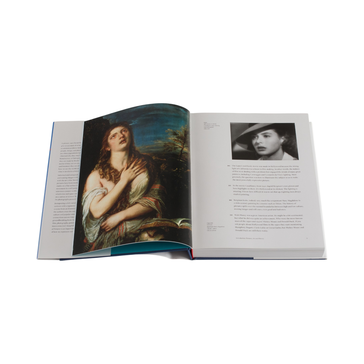 An open book displayed against a solid white background, showing a detailed page with a classical painting on the left and a black-and-white portrait page on the right.