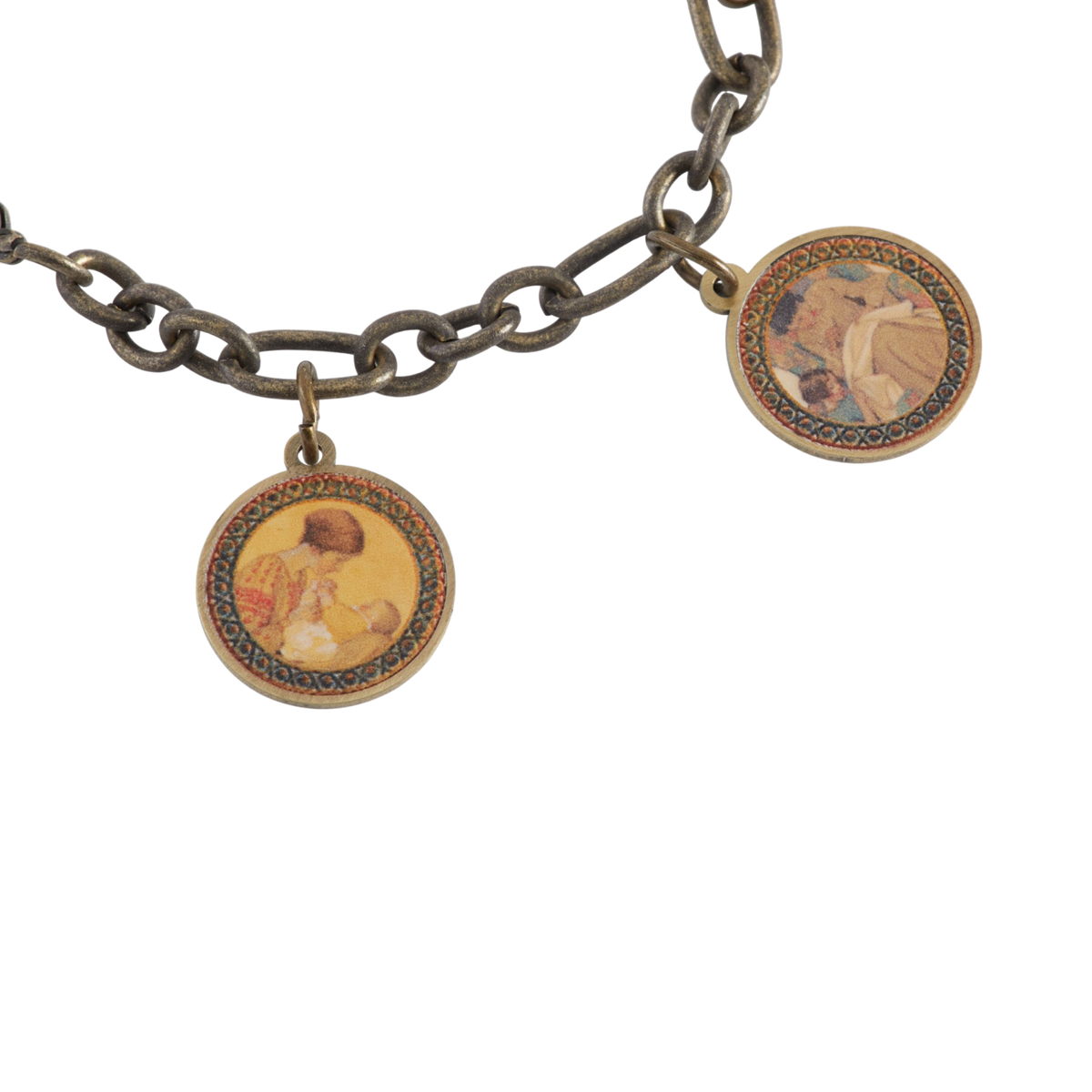 A close-up of an antique-style bronze chain bracelet featuring circular charms with vintage Jessie Willcox portrait illustrations.