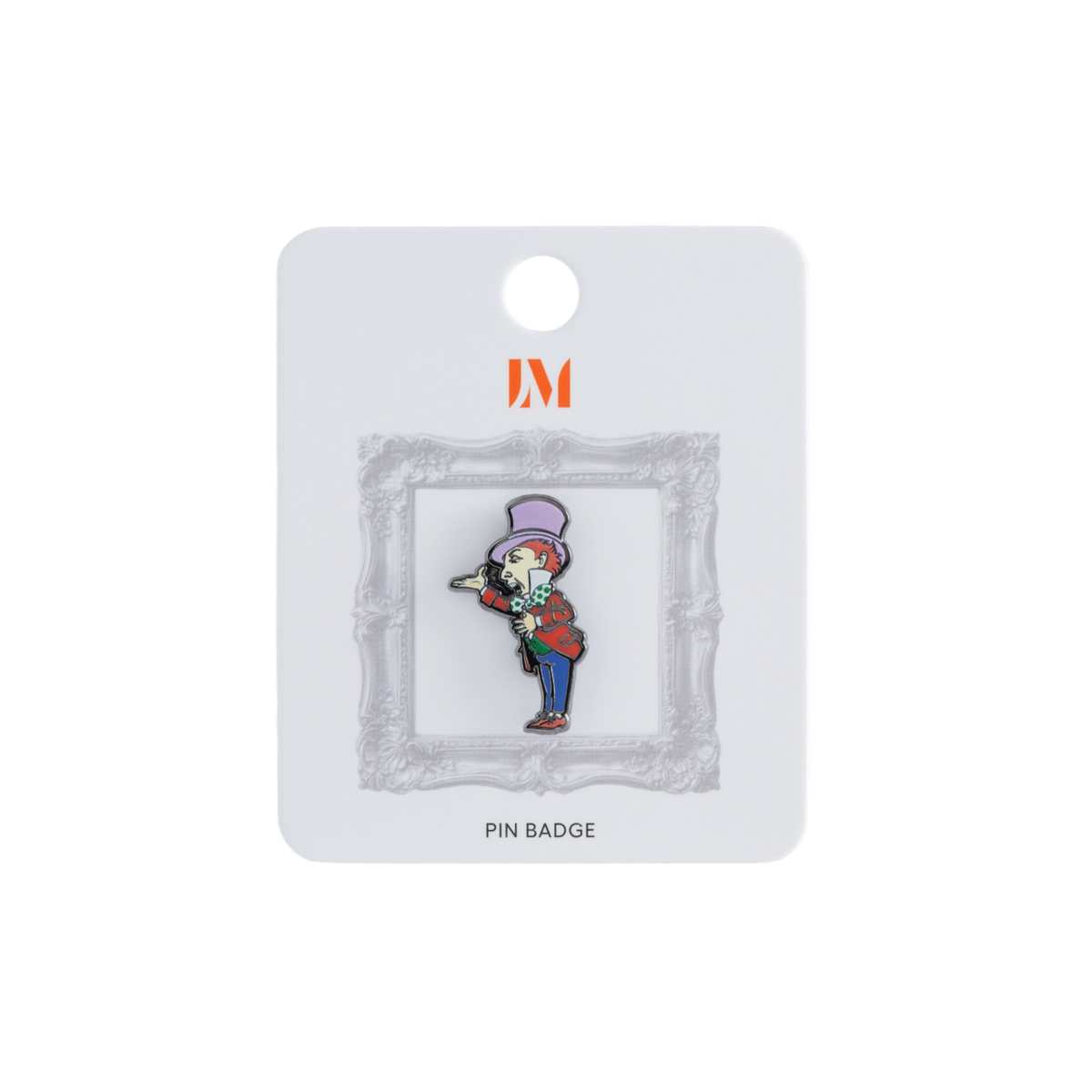 A small enamel pin badge displayed on a white backing card. The pin features a cartoon-style Mad Hatter figure in a purple top hat and red coat, set against a gray ornate frame.