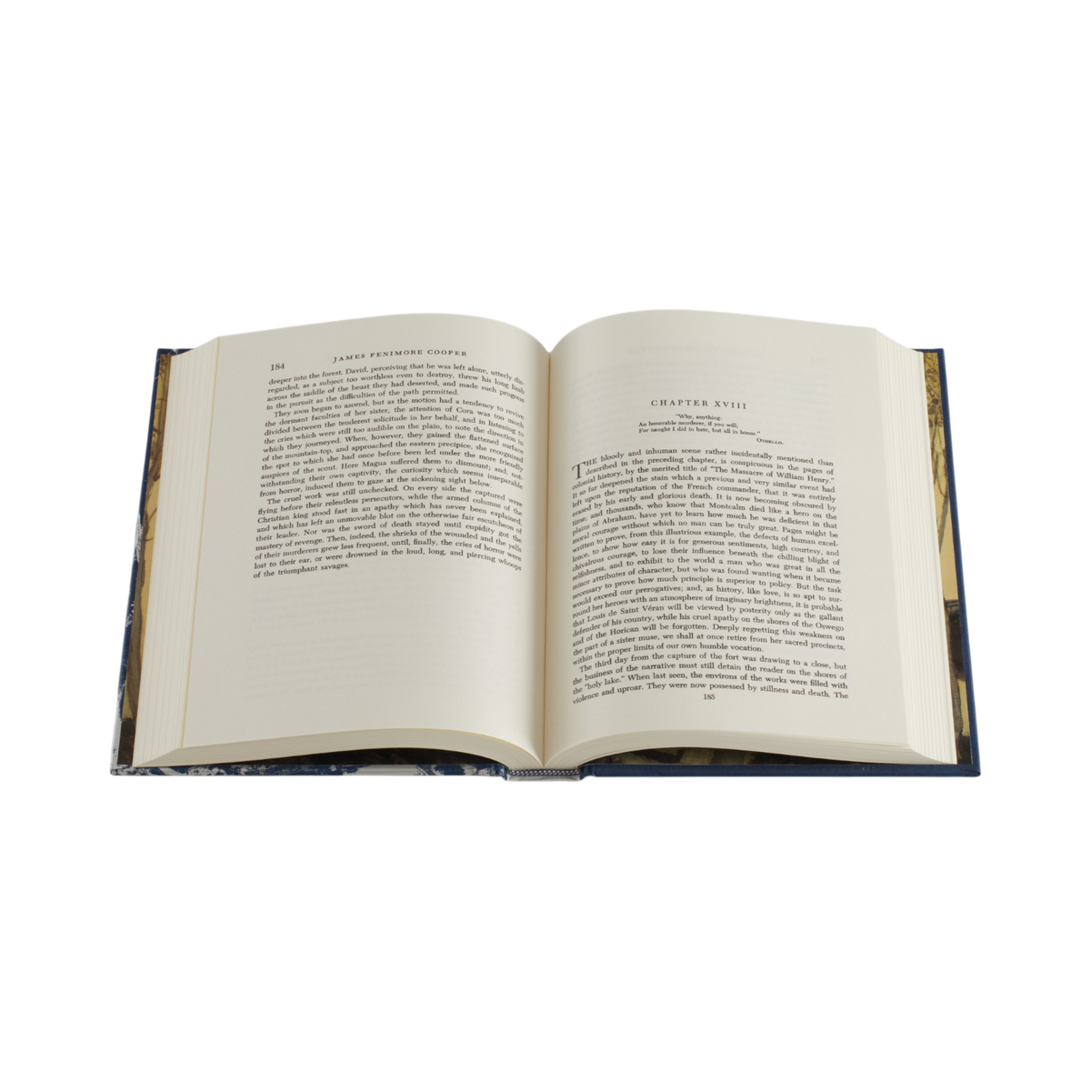 An open hardcover book with cream-colored pages displaying printed text, set against a solid white background.
