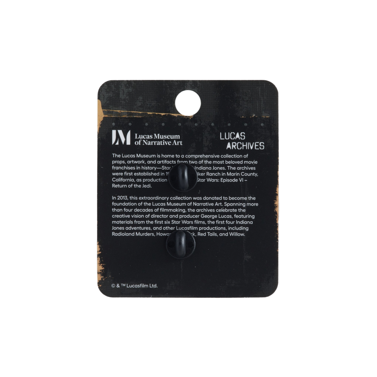 A black display card with a hanging hole and printed text for Lucas Museum of Narrative Art / Lucas Archives, featuring a small black figurine on a white background.