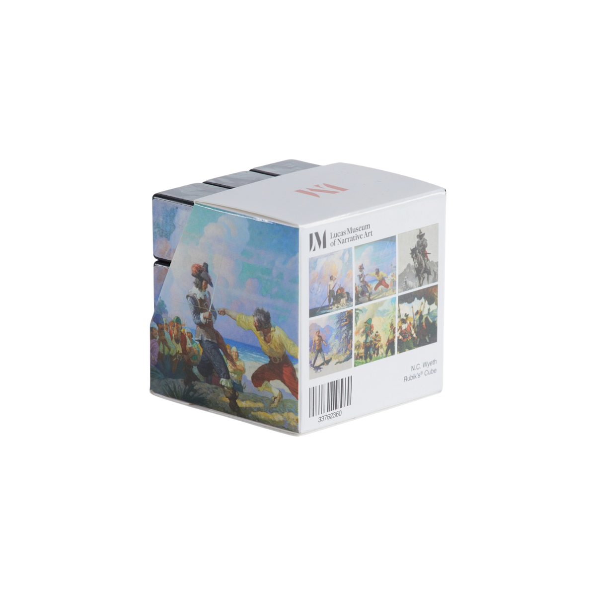 A white rectangular box for a Rubik's Cube, featuring the Lucas Museum of Narrative Art logo and six colorful paintings of historical figures on the front, photographed on a plain white background.